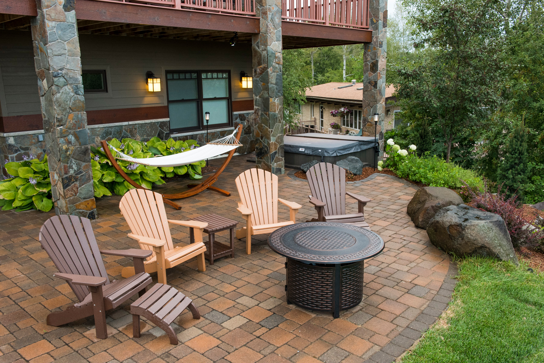 Outdoor patio with chairs and a hammock