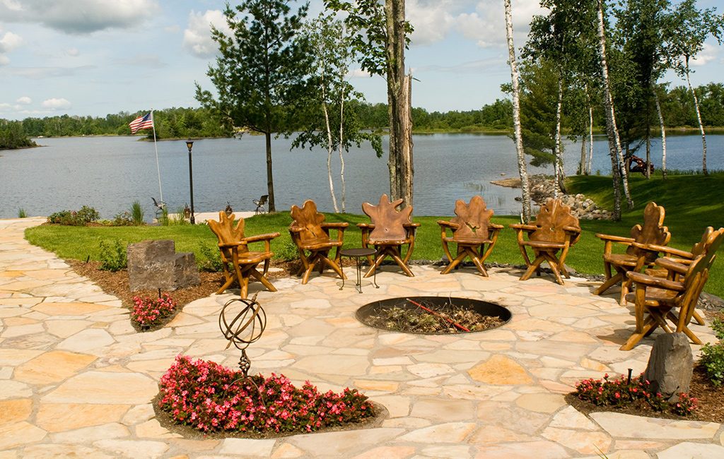firepit and patio near lake